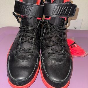 Nike Black and Orange Shoes with Bright Red Laces